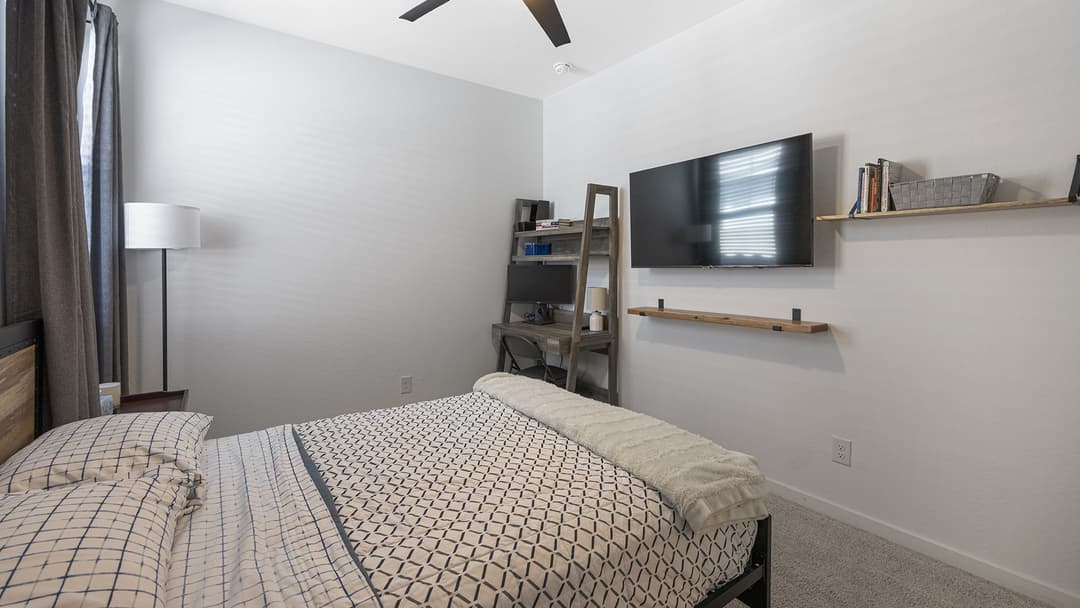 Cozy bedroom with a comfortable area for watching TV